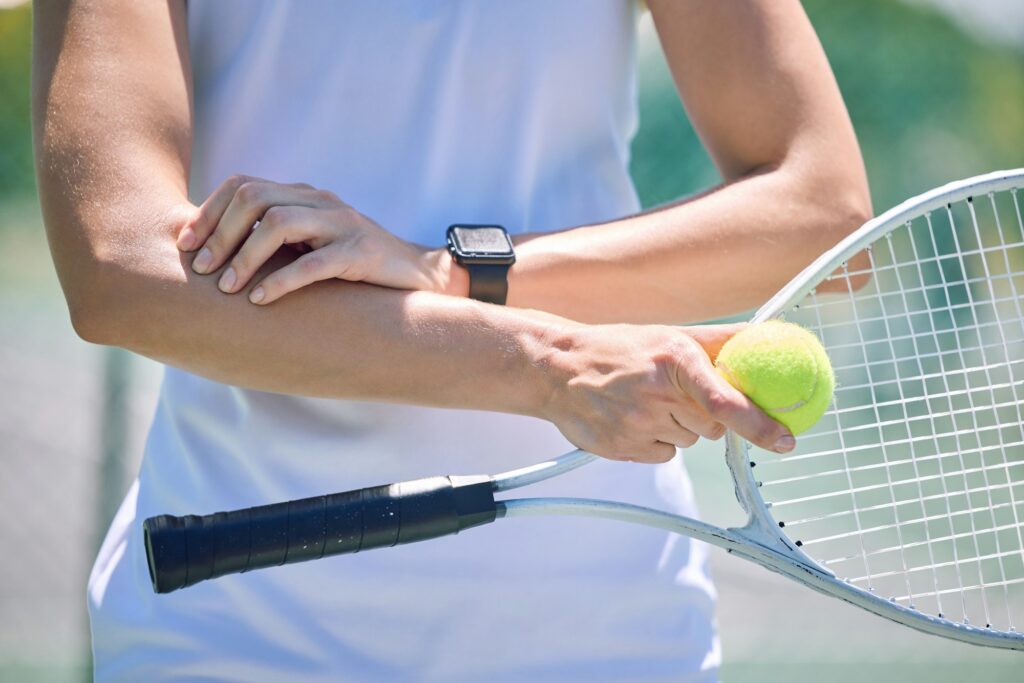 Sport, active and male tennis player with a racket and ball standing on a court ready for a match.